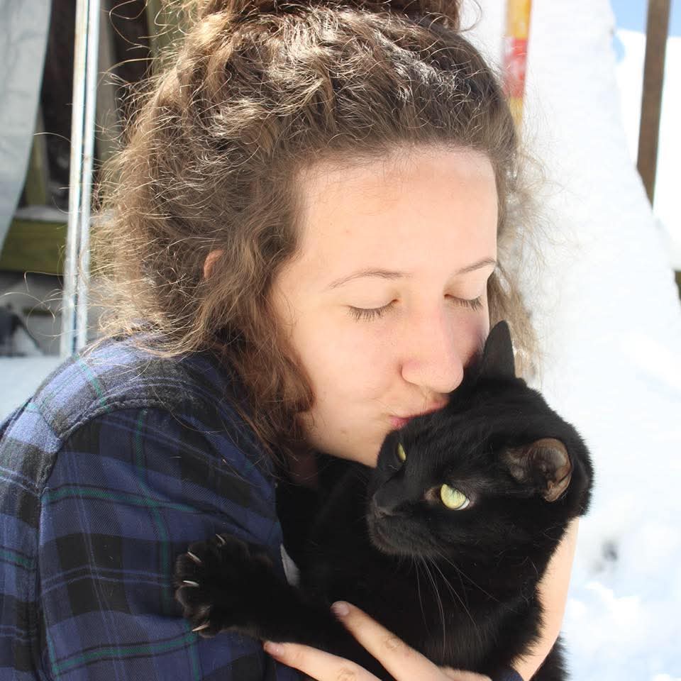 Photo of Percy being held by me when it snowed in January of 2018